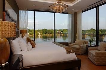 The stunning Riverview Suite is perfect as a VIP or bridal suite. These luxuriously appointed rooms feature customized furniture, a bar and sitting room and a two-sided fireplace.
